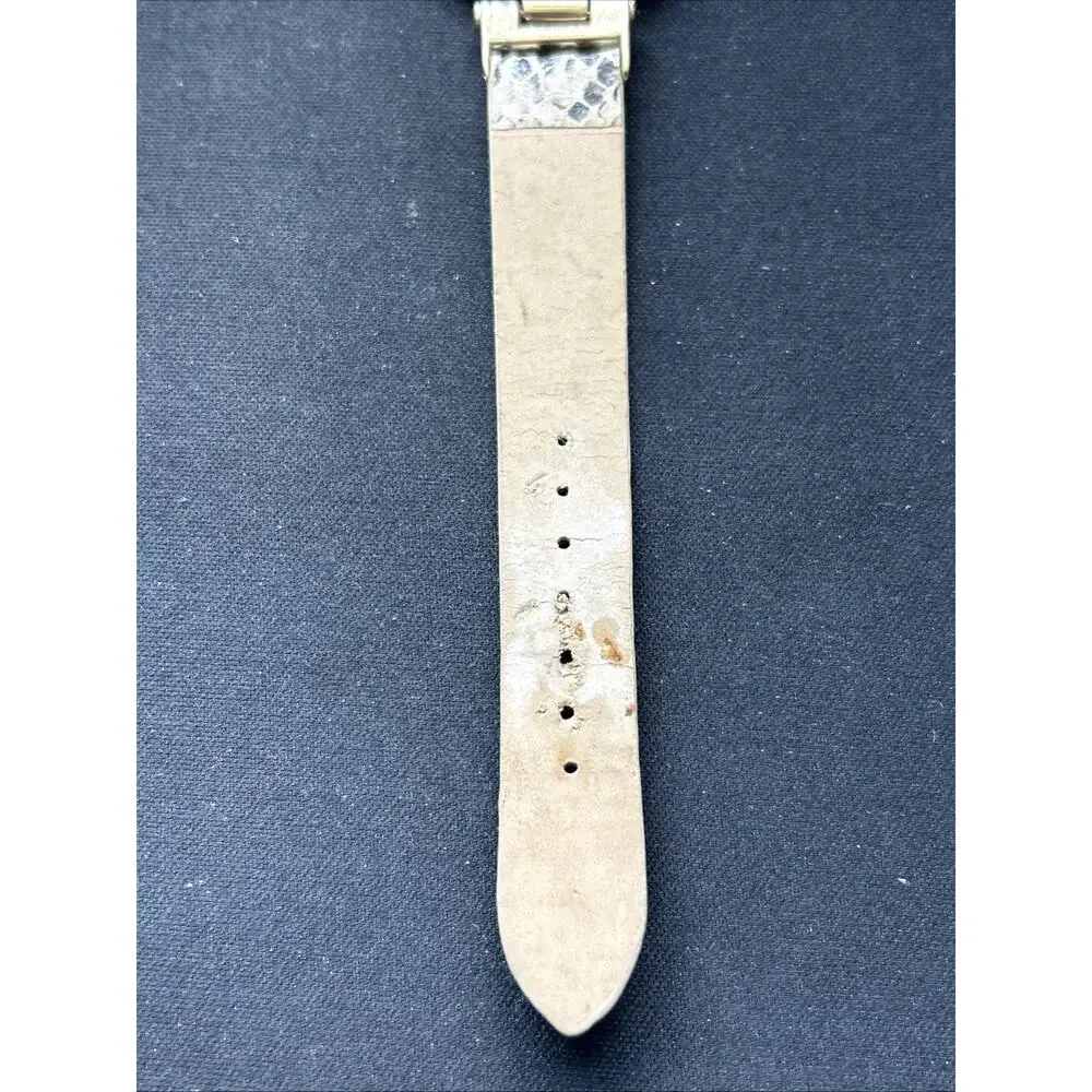 Embassy Gold Tone Snakeskin Type Band Women’s Quartz Watch